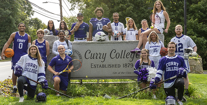 Ƶ Coloneles representing all of the NCAA teams and Cheerleading pose for a photo at the front gate